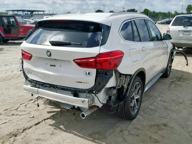 WBXHT3C32J5L30523 - 2018 BMW X1 XDRIVE2 WHITE photo 4