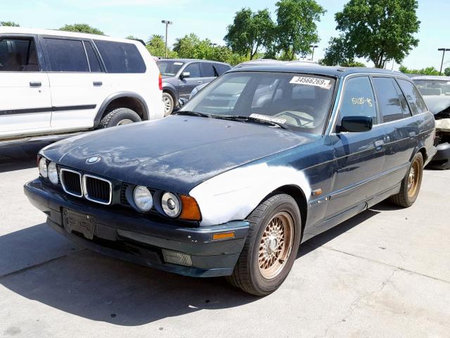 WBAHJ632XSGD26236 - 1995 BMW 525 IT AUT GREEN photo 2