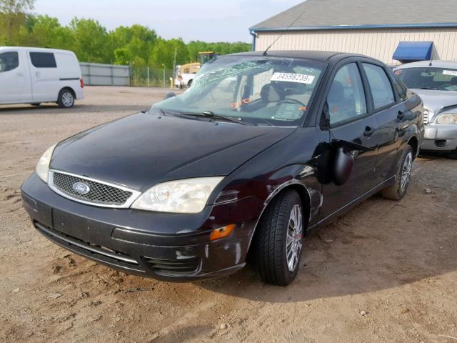 1FAFP34N85W310579 - 2005 FORD FOCUS ZX4 BLACK photo 2