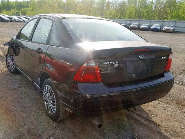 1FAFP34N85W310579 - 2005 FORD FOCUS ZX4 BLACK photo 3