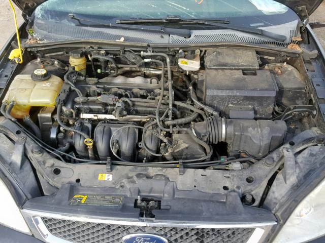 1FAFP34N85W310579 - 2005 FORD FOCUS ZX4 BLACK photo 7