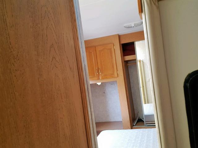 4YDF368254D507207 - 2004 KEYSTONE MONTANA WHITE photo 7