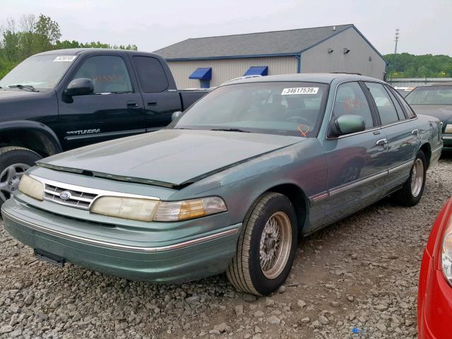 2FALP74W2VX168592 - 1997 FORD CROWN VICT GREEN photo 2