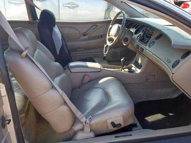 1G4GD2218V4701403 - 1997 BUICK RIVIERA BEIGE photo 5