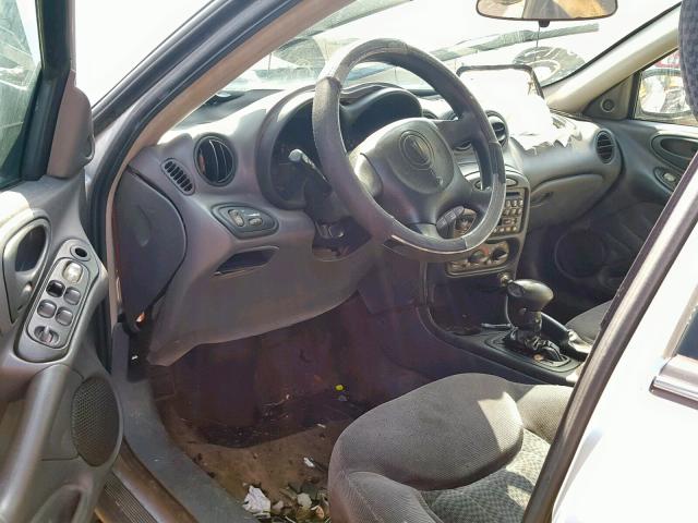 1G2NF52EX2M572221 - 2002 PONTIAC GRAND AM S SILVER photo 9