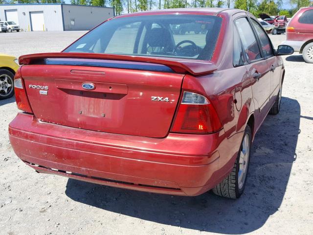 1FAFP34N85W179718 - 2005 FORD FOCUS ZX4 RED photo 4
