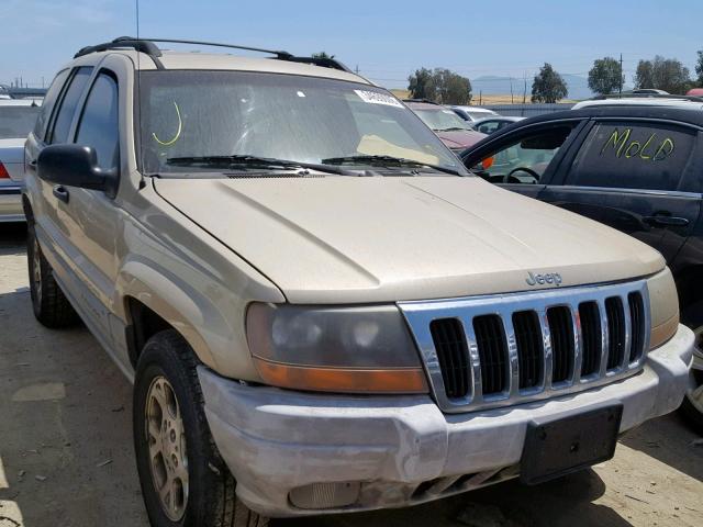 1J4GW48S91C669257 - 2001 JEEP GRAND CHER TAN photo 1