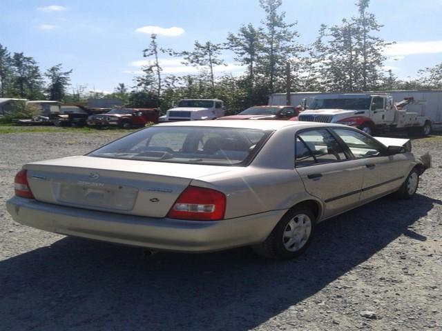 JM1BJ2215Y0204134 - 2000 MAZDA PROTEGE ES GOLD photo 4