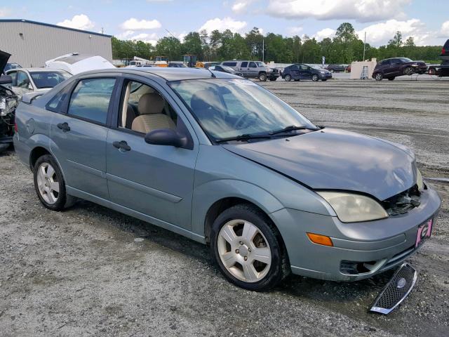 1FAFP34N05W103216 - 2005 FORD FOCUS ZX4 GREEN photo 1