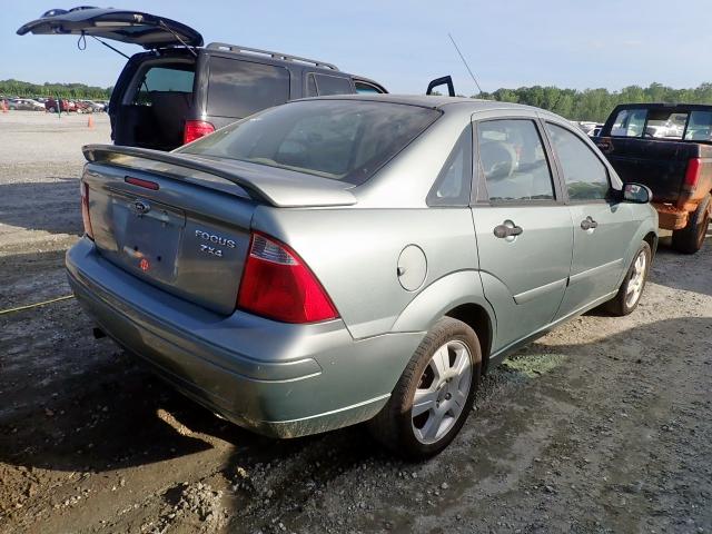 1FAFP34N05W103216 - 2005 FORD FOCUS ZX4 GREEN photo 4