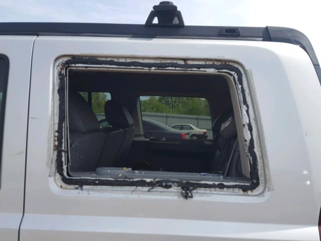 1J8HG48K77C617876 - 2007 JEEP COMMANDER SILVER photo 9