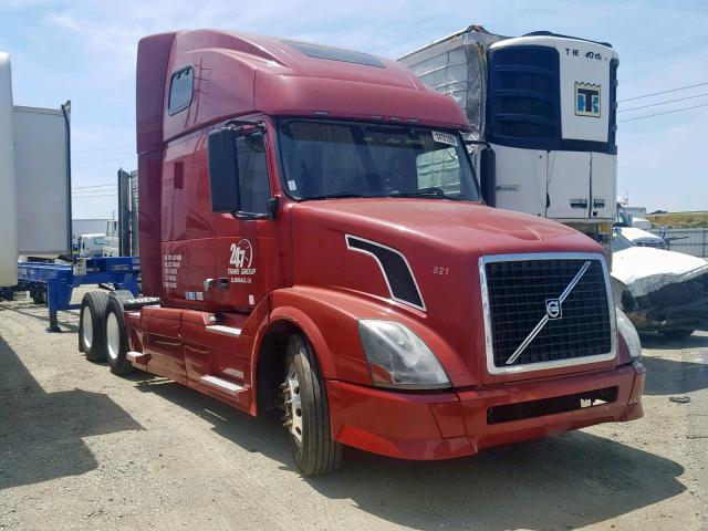 4V4NC9TH29N271259 - 2009 VOLVO VN VNL RED photo 1