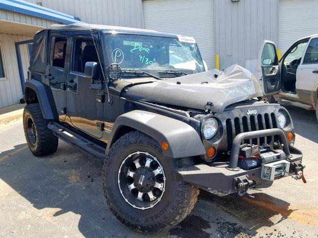 1J4BA3H15BL627700 - 2011 JEEP WRANGLER U BLACK photo 1
