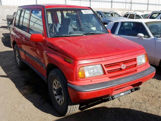 2S3TD03V8V6403779 - 1997 SUZUKI SIDEKICK J RED photo 1