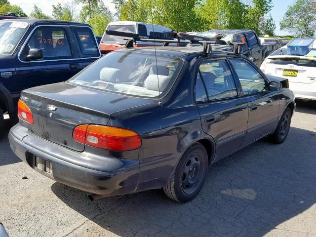 1Y1SK52882Z401020 - 2002 CHEVROLET GEO PRIZM BLACK photo 4