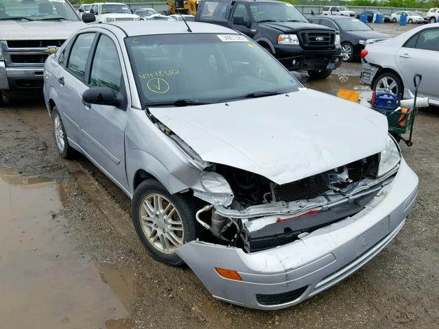 1FAFP34NX7W183112 - 2007 FORD FOCUS ZX4 SILVER photo 1