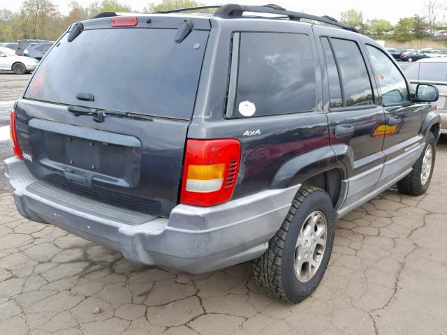 1J4GW58S8XC665246 - 1999 JEEP GRAND CHER BLACK photo 4