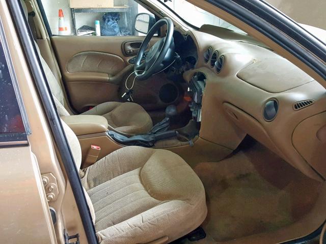 1G2NE52T5XC520848 - 1999 PONTIAC GRAND AM S GOLD photo 5