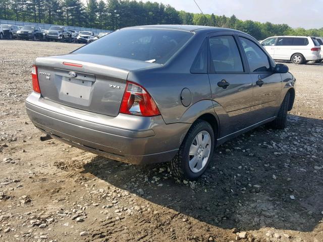 1FAHP34N96W126391 - 2006 FORD FOCUS ZX4 GRAY photo 4