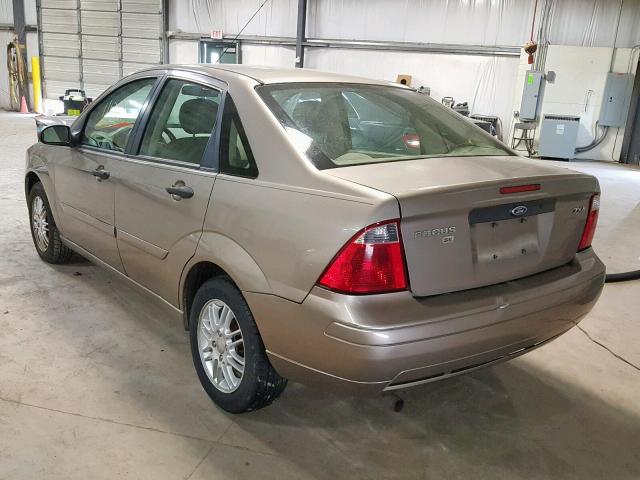 1FAFP34N55W251247 - 2005 FORD FOCUS ZX4 TAN photo 3