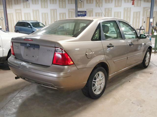 1FAFP34N55W251247 - 2005 FORD FOCUS ZX4 TAN photo 4