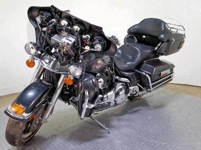 1HD1FC4117Y721039 - 2007 HARLEY-DAVIDSON FLHTCUI BLACK photo 4