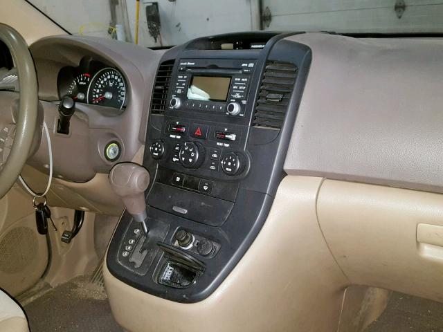 KNDMG4C79B6387807 - 2011 KIA SEDONA LX GOLD photo 9