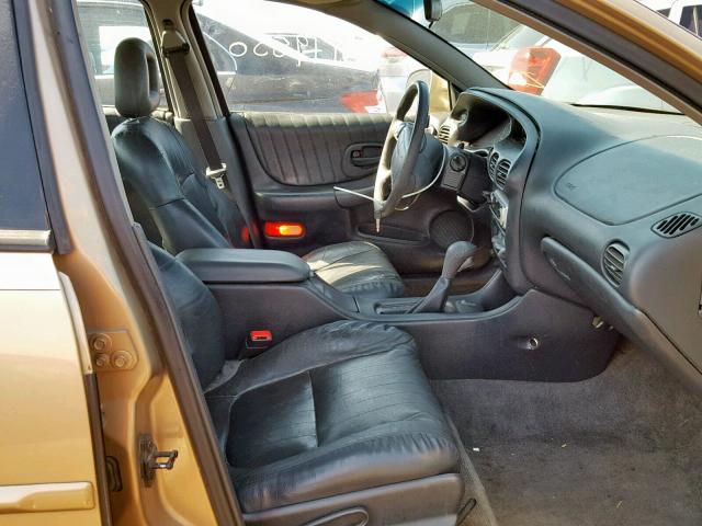 1G2WP52K9XF342527 - 1999 PONTIAC GRAND PRIX 金色 照片 5