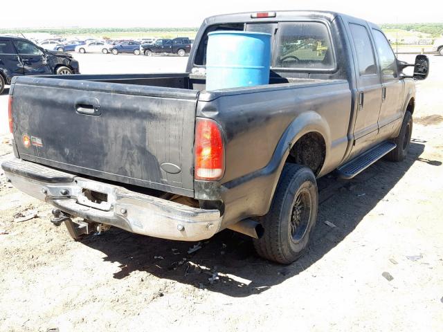 1FTSW31F62ED36088 - 2002 FORD F350 SRW S BLACK photo 4