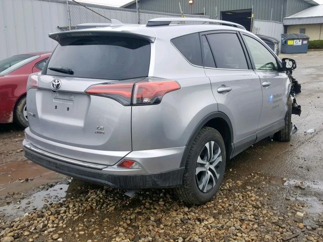 JTMBFREV9JJ256889 - 2018 TOYOTA RAV4 LE SILVER photo 4