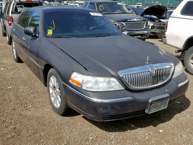 1LNHM84W33Y643979 - 2003 LINCOLN TOWN CAR E BLACK photo 1