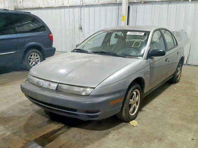 1G8ZG5281VZ341875 - 1997 SATURN SL1 GRAY photo 2