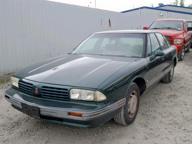 1G3HN52L5R4813753 - 1994 OLDSMOBILE 88 ROYALE GREEN photo 2