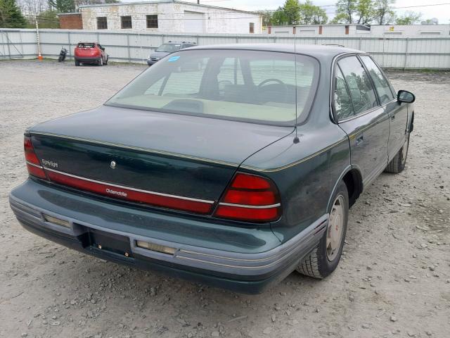 1G3HN52L5R4813753 - 1994 OLDSMOBILE 88 ROYALE GREEN photo 4