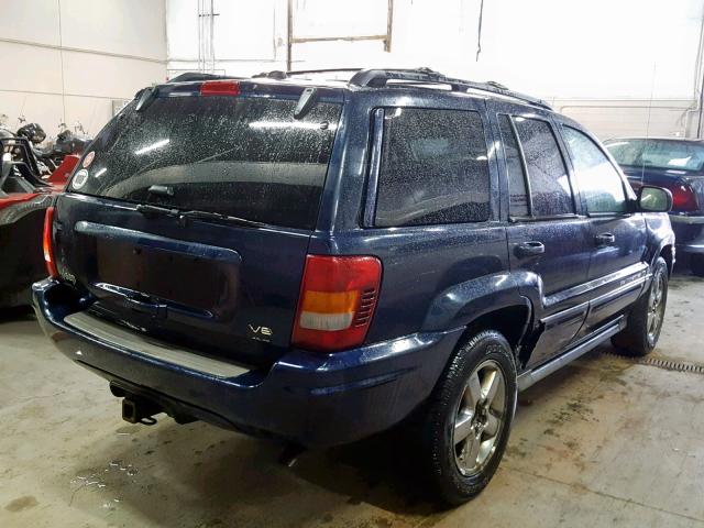 1J8GW68JX4C370561 - 2004 JEEP GRAND CHER BLUE photo 4