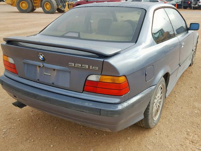 WBABF8337XEH63674 - 1999 BMW 323 IS AUT BLUE photo 4