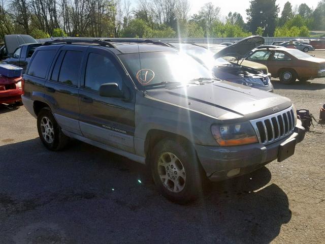 1J4GW58S5XC783240 - 1999 JEEP GRAND CHER GRAY photo 1