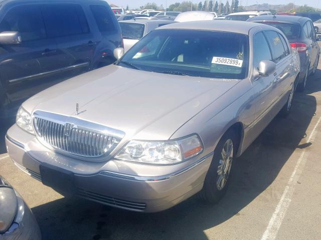 2LNBL8EV4AX751166 - 2010 LINCOLN TOWN CAR E SILVER photo 2