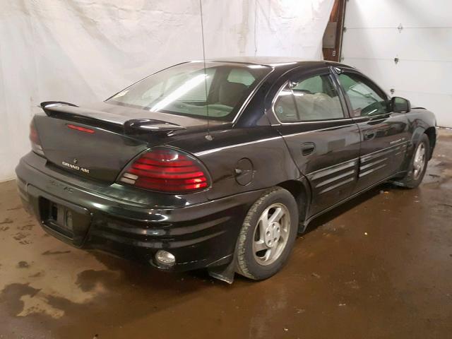 1G2NE52E3XC502852 - 1999 PONTIAC GRAND AM S BLACK photo 4