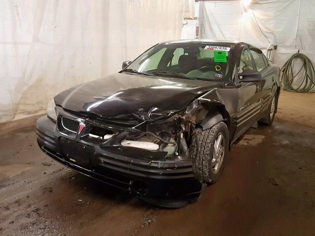 1G2NE52E3XC502852 - 1999 PONTIAC GRAND AM S BLACK photo 9