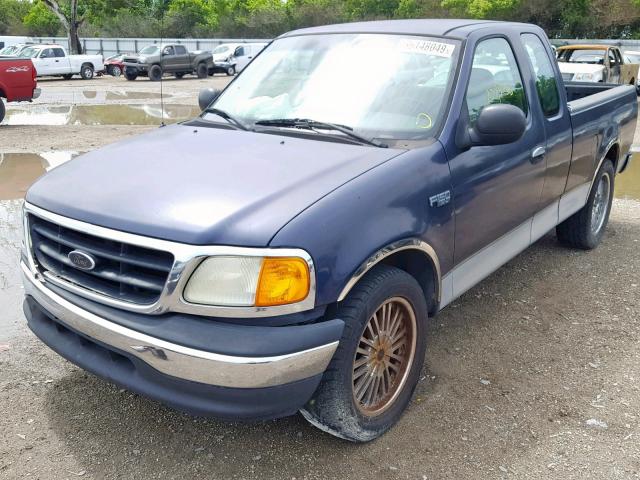 2FTRX17274CA46875 - 2004 FORD F-150 HERI BLUE photo 2