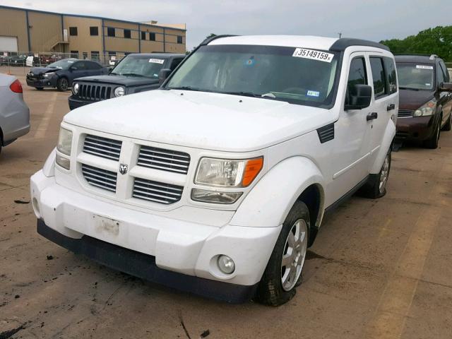 1D4PT4GK7BW587093 - 2011 DODGE NITRO HEAT WHITE photo 2