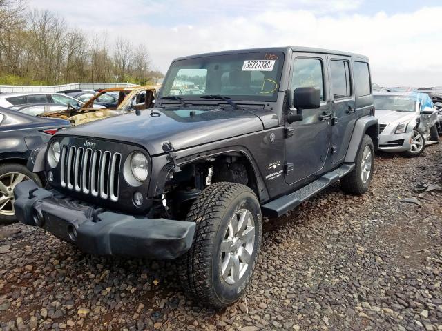 1C4BJWEG8GL279558 - 2016 JEEP WRANGLER UNLIMITED SAHARA  photo 2