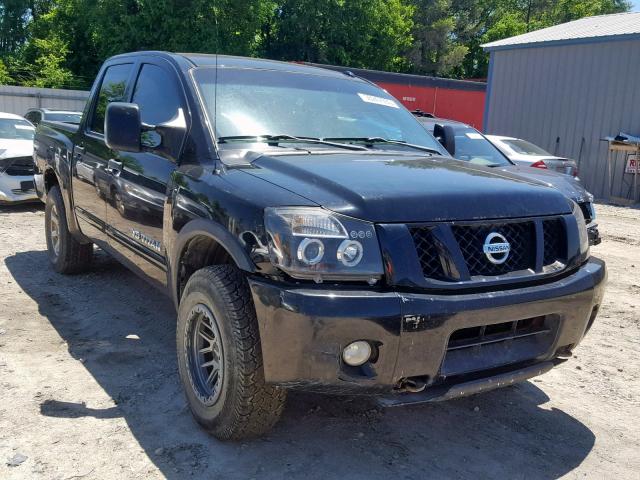 1N6BA0EC4BN304377 - 2011 NISSAN TITAN S BLACK photo 1