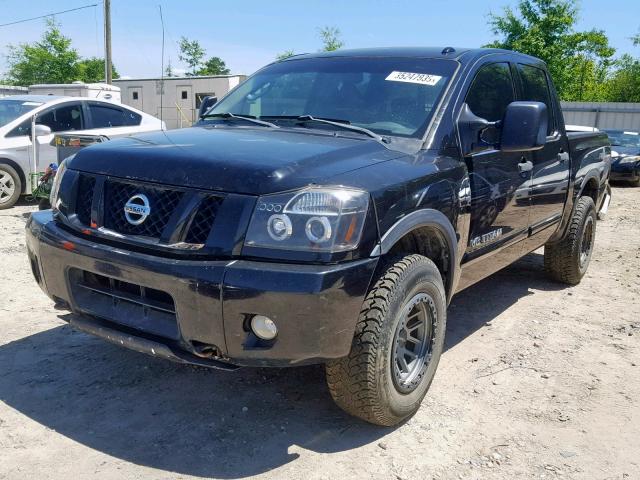 1N6BA0EC4BN304377 - 2011 NISSAN TITAN S BLACK photo 2