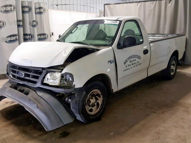 2FTRF17234CA27307 - 2004 FORD F-150 HERI WHITE photo 2