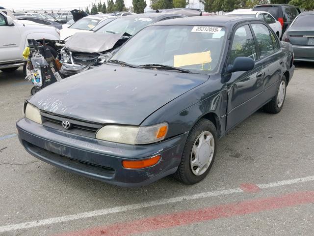 1NXBB02E1VZ562402 - 1997 TOYOTA COROLLA DX GREEN photo 2