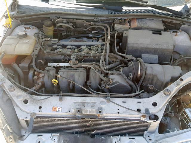 1FAFP34NX5W124350 - 2005 FORD FOCUS ZX4 SILVER photo 7