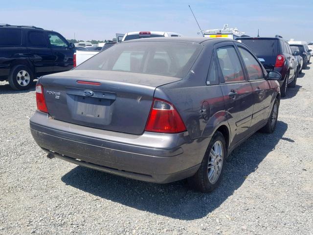 1FAFP34N27W267537 - 2007 FORD FOCUS ZX4 GRAY photo 4