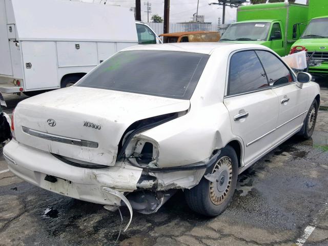 KMHFU45D11A120978 - 2001 HYUNDAI XG 300 WHITE photo 4